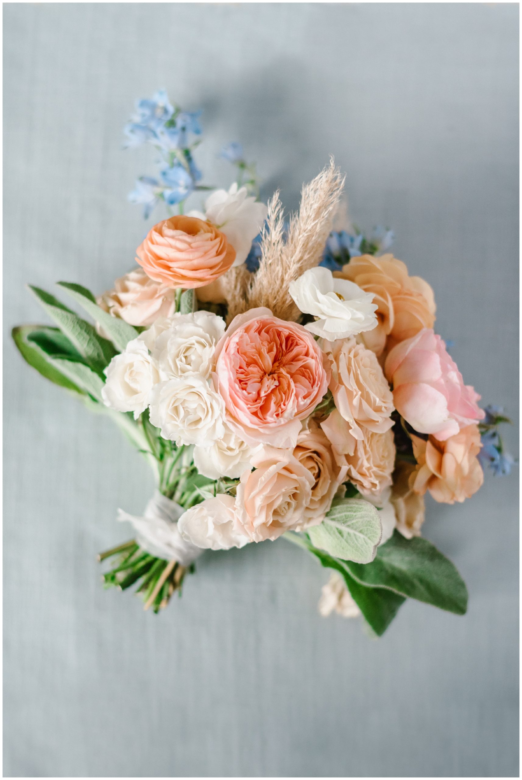 Blue, peach and orange fall wedding flowers by Earl Gray Floral | Austin Wedding