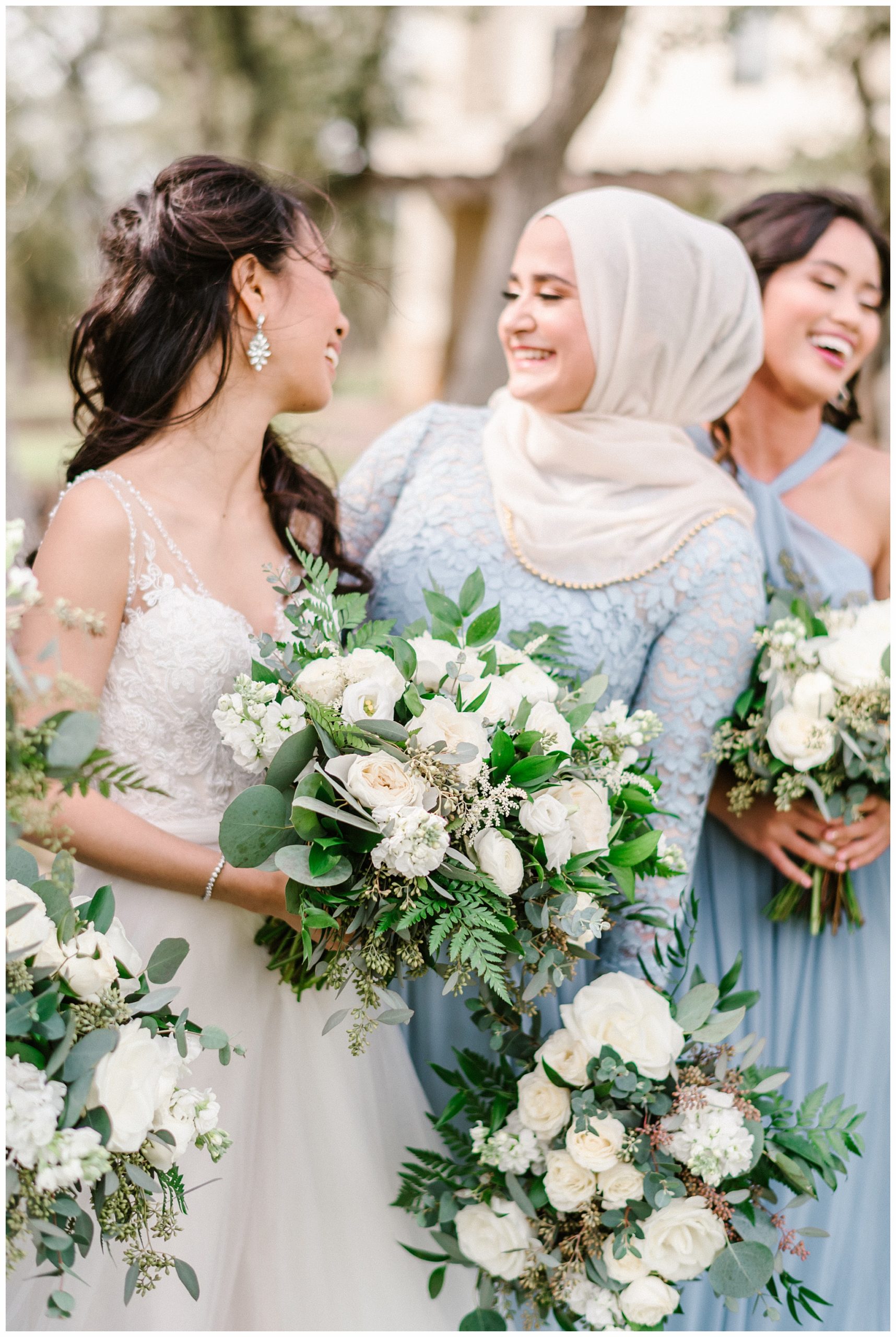 Bride laughing with her Maid of Honor