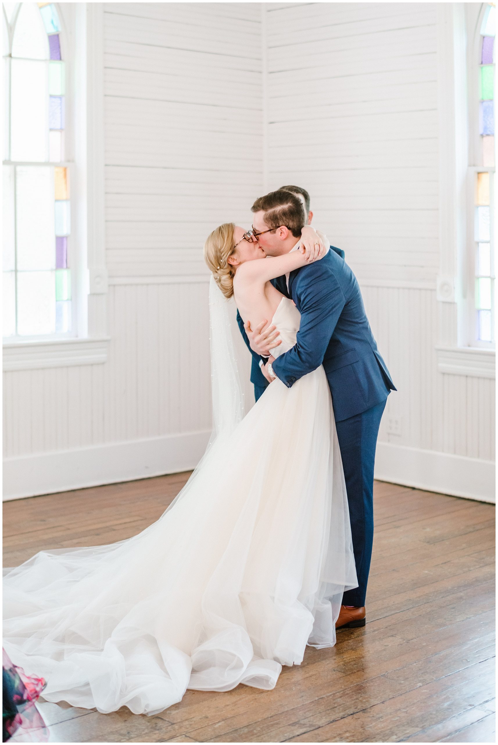 mercury hall intimate wedding ceremony with beautiful couple and bright florals