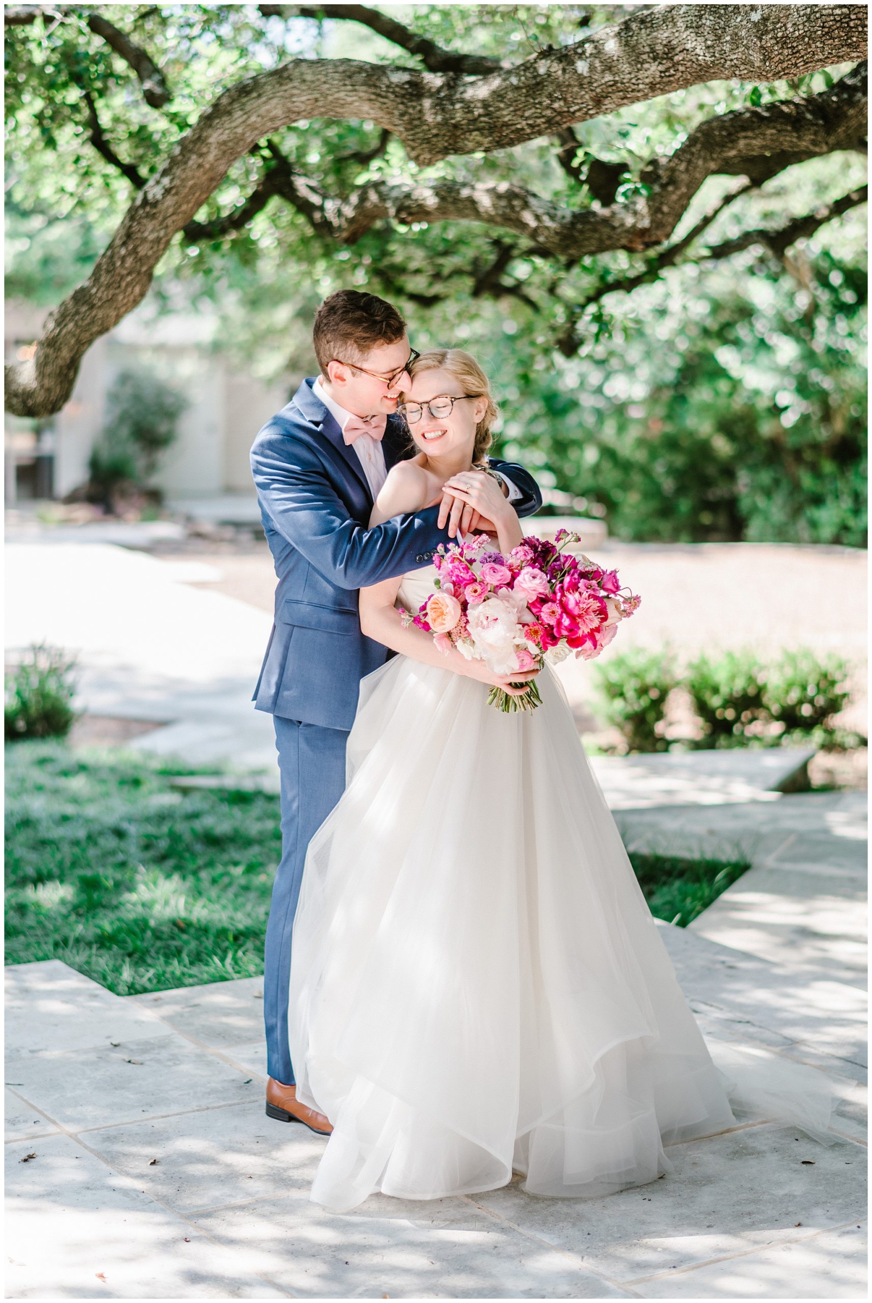 Beautiful couple wedding portraits with bright florals in soft light