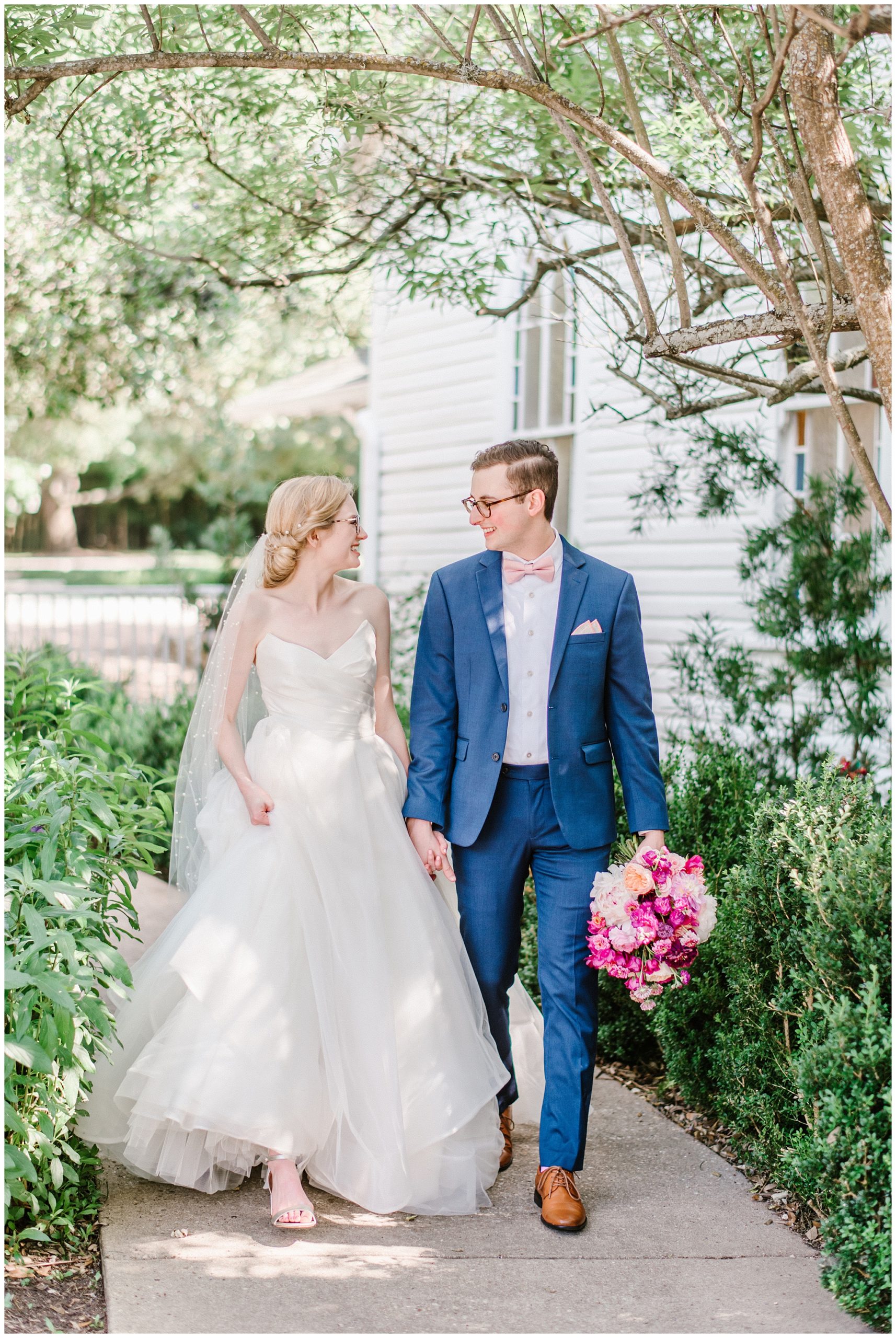 Beautiful couple wedding portraits with bright florals in soft light